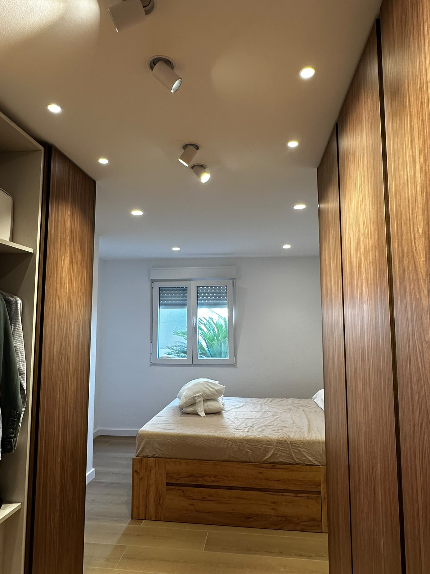 Ceiling lighting installed in a bedroom and dressing area
